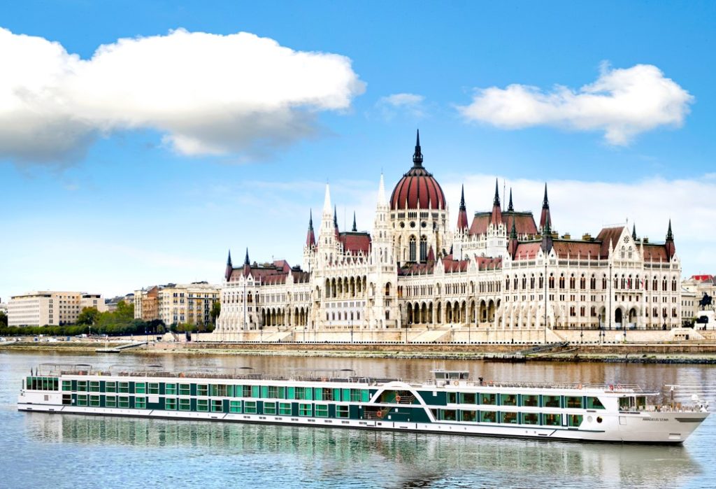 amadeus river cruise in front of budapest parliament